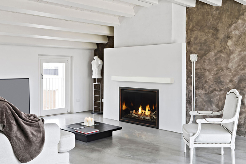 A simple, sleek fireplace in a white modern home layout.