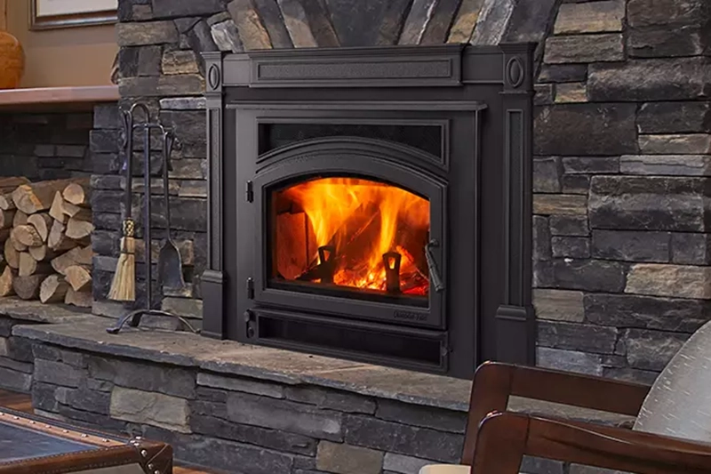A wall installed fireplace with a clean brake frame and brick layout