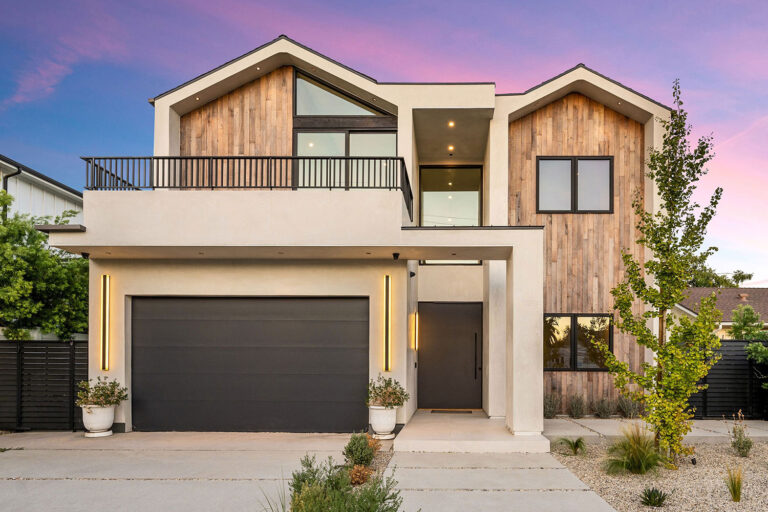Modern house with garage and wooden facade